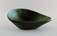 Accolay, France. Freeform bowl in glazed ceramics. Beautiful glaze in green and 
dark shades. 1960s.
