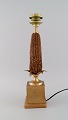 Maison Charles, 
France. Table 
lamp designed 
as a corn cob 
with base and 
brass leaves. 
1960s / ...