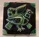 Relief 17.5 x 
17.5 cm Helge 
Christoffersen 
Green Glazed: 
Two birds
Helge 
Christoffersen 
17th ...