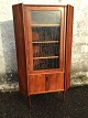 Corner cabinet in rosewood veneer with glass door. Measurements Height 155 cm, width 89 cm. ...