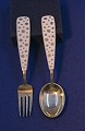 Michelsen set Christmas spoon and fork 1945 of 
Danish gilt silver