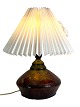 Ceramic table lamp in brown colors with paper shade, by Herman A. Kähler from the 1940s. The ...