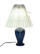 Ceramic table 
lamp with blue 
glaze and paper 
shade, by 
Michael 
Andersen. The 
lamp is in 
great ...