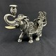 Height 13.5 cm.Length 17 cm.The elephant is stamped with German silver hall marks and 830S ...