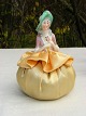 Porcelain 
figurine. Half 
doll woman. 
Height 8 cm.