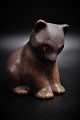 Small glazed 
ceramic figure 
of bear, design 
Knud Basse. 
Height: 14 cm.