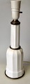 Heiberg lamp in 
white 
porcelain, 20th 
century with 
brass. Height 
without 
electrical 
mounting: 29 
cm.