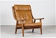 Hans J. Wegner (1914-2007)Easy Chair GE 530 made of dark stained oakwith cushions of ...