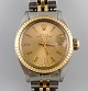 Rolex Oyster 
Lady Perpetual 
Gold Date. 
Ladies 
wristwatch, 
original 
bracelet in 
two-tone steel 
...