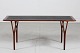 Helge 
Vestergaard 
Jensen
Coffee table 
made of 
rosewood
with table top 
of black 
leather ...