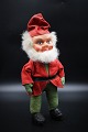 Nice old Santa 
stuffed with 
hay , wearing 
nice Santa 
clothes in 
fabric and 
clogs. 
Height:32 cm.