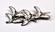 Brooch in sterling silver with enamel, The 5 Nordic swans, Design: Erik Magnussen. 20th century ...