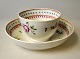 Chinese cup 
with saucer, 
19th century. 
Hand-painted 
decorations 
with geometric 
patterns and 
red ...