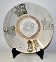 Korean dish in porcelain, 17./18. With printed decorations in green on a gray glaze. H .: 6 cm. ...