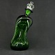 Height 26 cm.Cluck Cluck flask with crown stopper from Holmegaard.The flask is one of ...