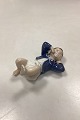 Royal 
Copenhagen 
Figurine Child 
on Back No. 
4669. Designed 
by John 
Galster. 
Measures 8 cm 
x 14 ...
