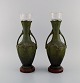 Hippolyte François Moreau (1832-1927), French sculptor. A pair of antique art nouveau vases with ...