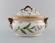 Large Royal Copenhagen Flora Danica soup tureen in hand-painted porcelain with 
flowers and gold decoration. Model number 20/3558.
