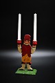 Old Swedish 
painted 
Christmas 
candlestick in 
the shape of 
little Santa 
boy carrying 2 
small ...