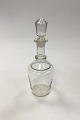 Holmegaard Glass carafe cylindrical shape, line around neck, hollow Cork. From the end of the ...