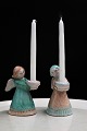 Glazed ceramic angels from Hjorth who carry a small Christmas candle. Height:9cm. 1 pcs. ...