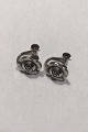 Georg Jensen 
Silver Earrings 
No 89 (Screws) 
Measures Diam 
1.2 cm (½ in) 
Combined weight 
3.8 gr / ...