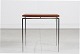 Knud JoosSmall side table with floating tabletop of teak veneer and thin square steel ...