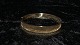 Elegant 
bracelet 14 
carat Gold
Stamped jøl 
585
Measures 60.18 
* 51.85 mm dia
Height 
7.5-10.12 ...