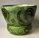 Danish Art 
Nouveau 
flowerpot, 
approx. 1900. 
Green glazed 
with floral 
ornamentation 
Stamped. ...