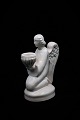 White glazed Christmas angel from Hjorth ceramics - Denmark, which holds a candle (normal ...