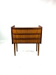 Small Dresser In Rosewood with 3 drawers from the 1960s. Very useful furniture, which fits well ...