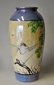 Japanese porcelain vase, approx. 1920. With hand-painted decoration in the form of a flying ...