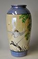 Japanese 
porcelain vase, 
approx. 1920. 
With 
hand-painted 
decoration in 
the form of a 
flying ...