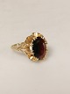 8.carat finger 
ring with 
reddish brown 
stone size 60
