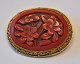 Chinese lacquer brooch in gold-plated silver, approx. 1900. Decorated with flowers. Oval with ...