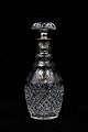 Fine old spirit carafe in glass with fine grinding and silver mounting. Stamped. Height: 29cm.