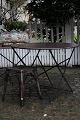 Old French café table in trimmed iron with a super fine dark patina. The table is finished and ...