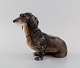 European porcelain maker. Porcelain figure. Seated dachshund. 1930s / 40s.Measures: 23 x 17 ...