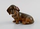 Royal Copenhagen porcelain figurine. Seated dachshund. Model number 3140. Dated 1964.Measures: ...