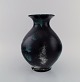 Jens Thirslund 
for Kähler, 
HAK. Vase in 
glazed 
stoneware. 
Beautiful glaze 
in shades of 
black, ...