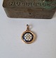 Maritime pendant in 18 kt gold decorated with compass rose and anchor in enamel.The enamel ...