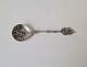 Sugar spoon in silver, richly decorated with ship on the shaftStamp 830sLength 11.3 cm.