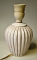Danish potter (20th century): Table lamp. White glazed clay. With grooves. In the side hole for ...