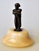 Miniature 
bronze figure, 
full portrait 
of Napoleon, 
19th century, 
France. On 
round base of 
light ...