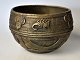 African bronze 
bowl with 
decorations, 
19./20. 
century. 
Decorations on 
the sides with 
geometric ...