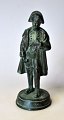 Cast figure of Napoleon, 19th century France. Patinated metal. H .: 12.5 cm.