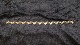 Elegant bracelet in 14 carat GoldStamped 585Length 19 cmWidth 9.91 mmThickness 2.70 ...