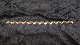 Elegant 
bracelet in 14 
carat Gold
Stamped 585
Length 19 cm
Width 9.91 mm
Thickness 2.70 
...