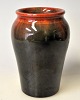 Michael 
Andersen & Son 
vase, Bornholm, 
20th century 
Denmark. Clay 
with dark and 
red glazes. ...