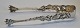Sugar tongs in 
silver, 
Augsborg, 19th 
century 
Germany. Rococo 
style. 
Decorated with 
putto and ...